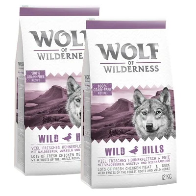 Wolf of Wilderness Wild Hills -koiranruokapakkaus, 12 kg. Teksti: 100% grain-free recipe, lots of fresh chicken meat & duck with fruits of the forest, roots and wild herbs.