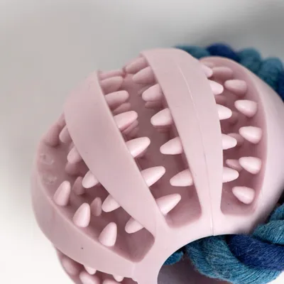 Jouet distributeur de collations avec corde en polyester