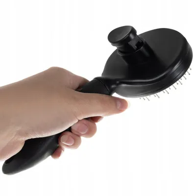 Brosse autonettoyante pour animaux de compagnie
