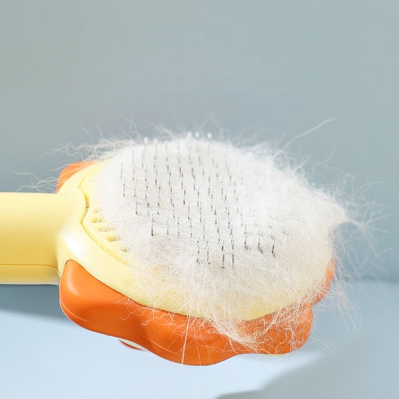 Petopia Peigne anti - poils et démêlant en forme de giroflée