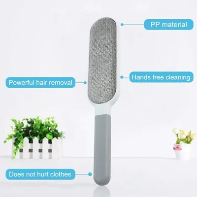 Brosse anti-poils double face : élimine poils chat/chien & peluches Brosse anti-poils double face : élimine poils chat/chien & peluches