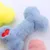 Jouet os en peluche rose pour chien avec sifflet - Doux et amusant Jouet os en peluche rose pour chien avec sifflet - Doux et amusant