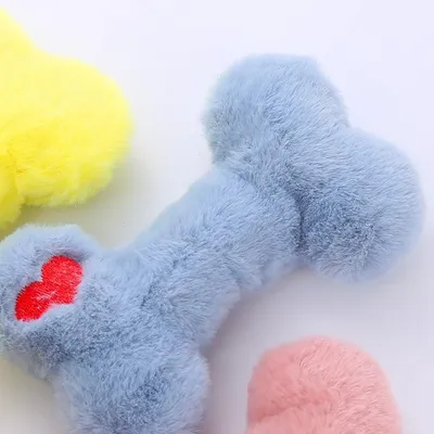 Jouet os en peluche rose pour chien avec sifflet - Doux et amusant Jouet os en peluche rose pour chien avec sifflet - Doux et amusant