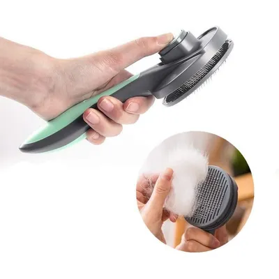 Brosse autonettoyante pour chats et chiens avec bouton de déverrouillage Brosse autonettoyante pour chats et chiens avec bouton de déverrouillage